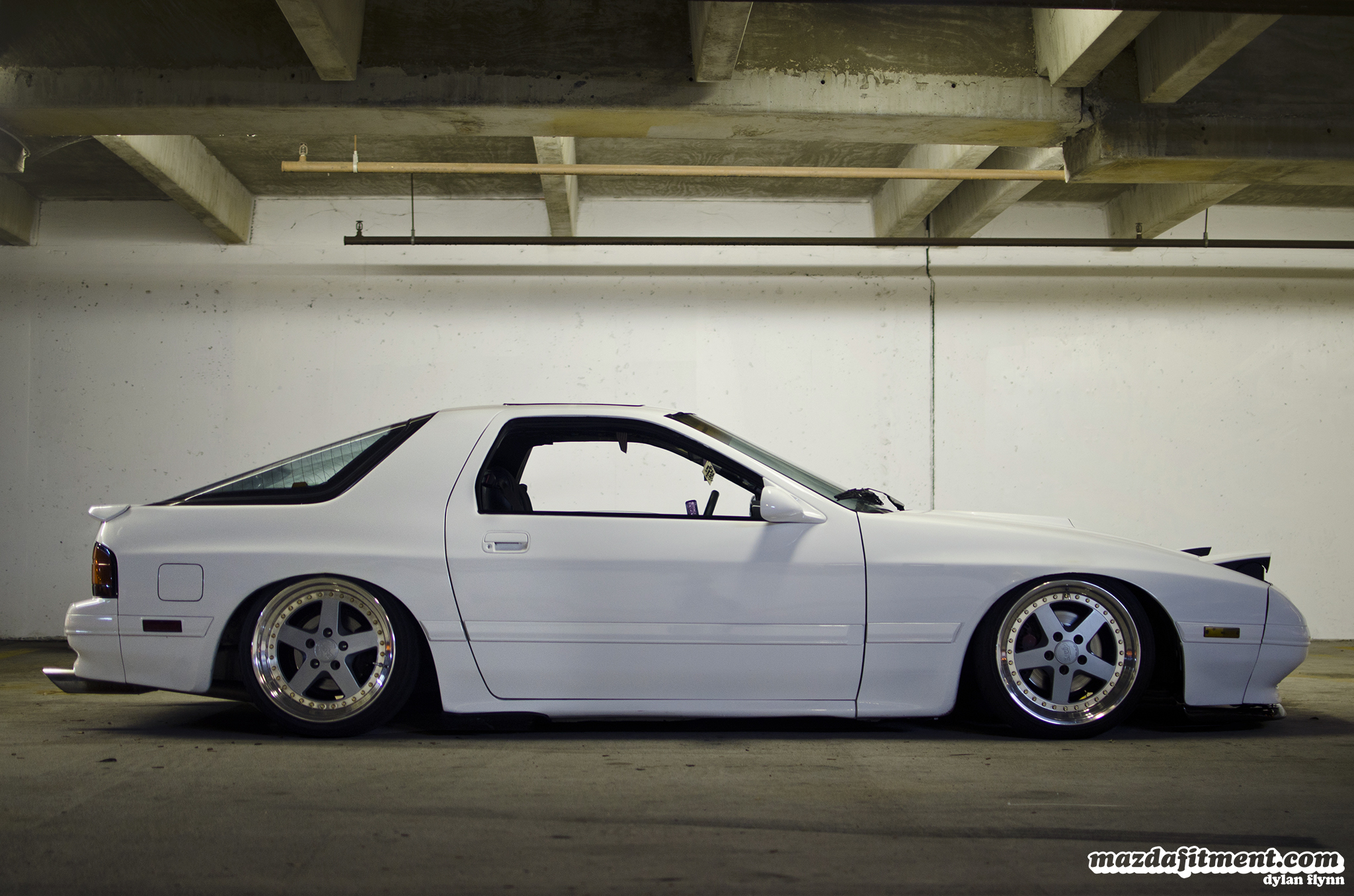 This can be seen with Luis Diaz’s 1991 Crystal White Mazda RX-7 F...